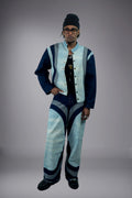 Full-body front view of a two-tone denim jacket worn open with matching wide-leg jeans and curved panel details. - Motor Cycle Triple Jean